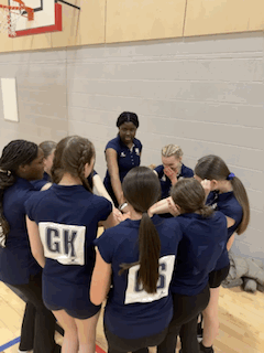 girls for kirkintilloch high doing a huddle