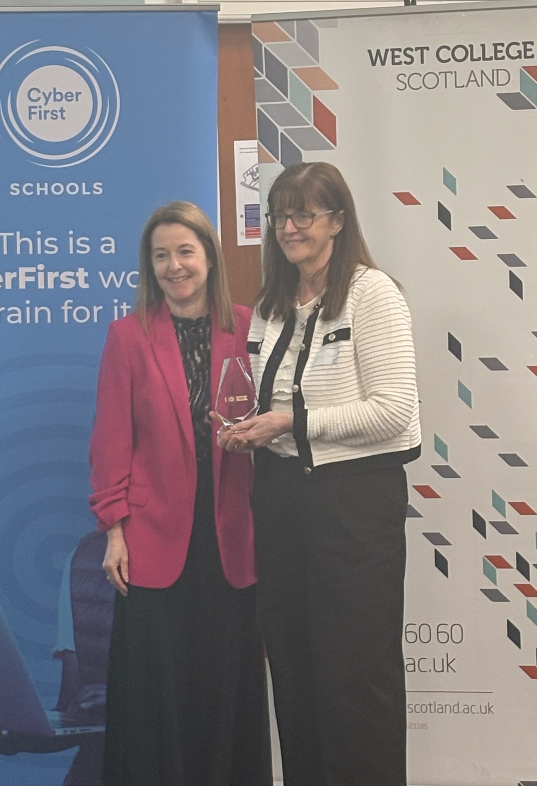 Mrs Dorans being presented with the CyberFirst award