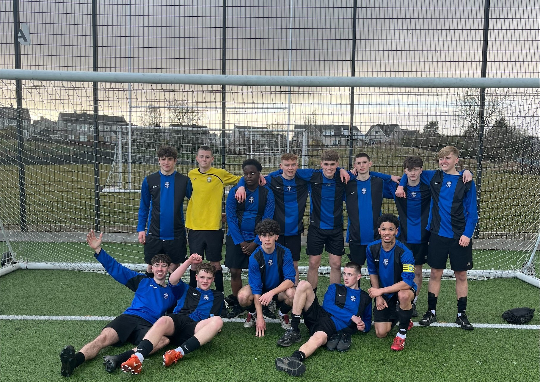 Kirkintilloch High under 18s football team celebrate winning the league
