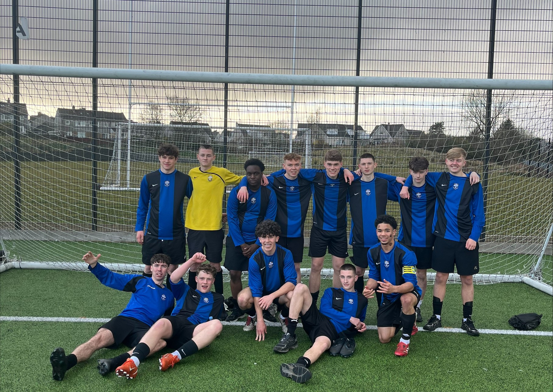 Kirkintilloch High under 18s football team celebrate winning the league